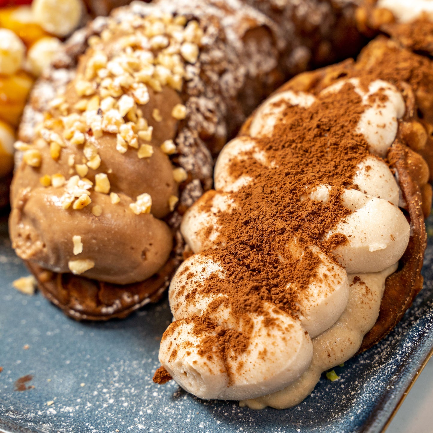 Modulare Box mit süßen Cannoli zur Auswahl